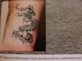 Tatuaż dla braci: wąż z koroną na głowie, symbol siły i zwycięstwa.